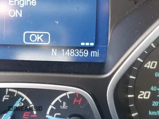 2014 Ford Focus SE with VIN 1FADP3F21EL209637, listed as a IAAI auction lot 42063454 with 148,359 mi miles. Bid and sale history available at carsss.com. Image 7.