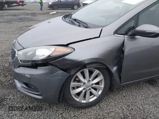 2014 Kia Forte EX with VIN KNAFX4A8XE5213014, listed as a IAAI auction lot 41000589 with 89,890 mi miles. Bid and sale history available at carsss.com. Image 6.