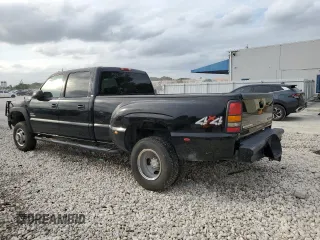 2005 Chevrolet Silverado 3500 DRW LT with VIN 1GCJK33265F908745, listed as a Copart auction lot 76309194 with 214,080 mi miles and Salvage Title. Bid and sale history available at carsss.com. Image 2.