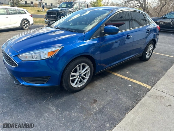 2018 Ford Focus SE with VIN 1FADP3FE3JL244605, listed as a Copart auction lot 51377045 with 124,075 mi miles and Clean Title. Bid and sale history available at carsss.com. Image 2.