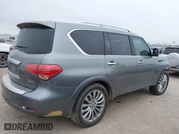 2015 Infiniti QX80 with VIN JN8AZ2NF1F9571315, listed as a IAAI auction lot 41522434 with 166,947 mi miles. Bid and sale history available at carsss.com. Image 4.