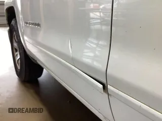 2015 Chevrolet Silverado 1500 LT with VIN 1GCRCREC0FZ257752, listed as a IAAI auction lot 42298229 with 132,830 mi miles and . Bid and sale history available at DreamBid. Image 7.