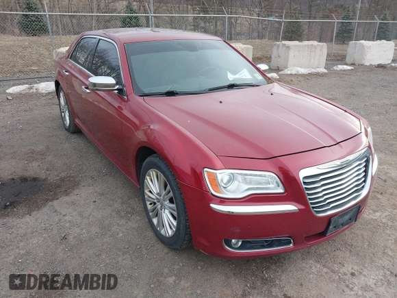 2012 Chrysler 300 C with VIN 2C3CCAKT4CH217217, listed as a IAAI auction lot 41502473 with 193,258 mi miles and . Bid and sale history available at DreamBid. Image 1.