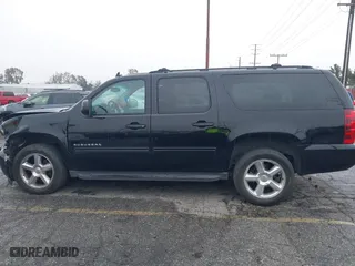 2010 Chevrolet Suburban LT with VIN 1GNUKJE35AR118585, listed as a IAAI auction lot 41730021 with 195,692 mi miles. Bid and sale history available at carsss.com. Image 14.