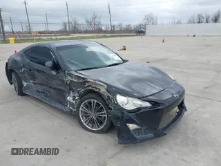 2013 Scion FR-S with VIN JF1ZNAA18D2731295, listed as a IAAI auction lot 41804731 with 97,138 mi miles. Bid and sale history available at carsss.com. Image 1.