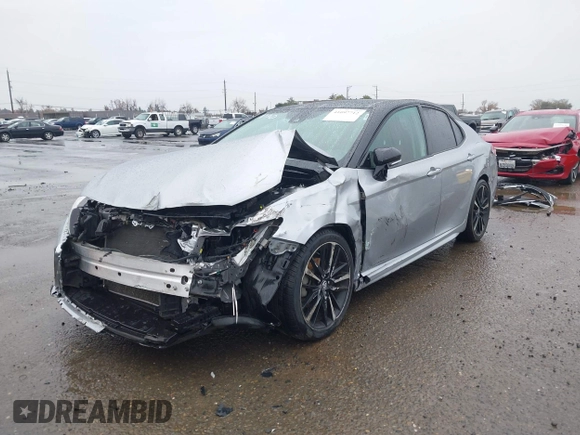 2020 Toyota Camry XSE with VIN 4T1K61AK1LU318098, listed as a IAAI auction lot 41097712 with 64,118 mi miles and . Bid and sale history available at DreamBid. Image 18.
