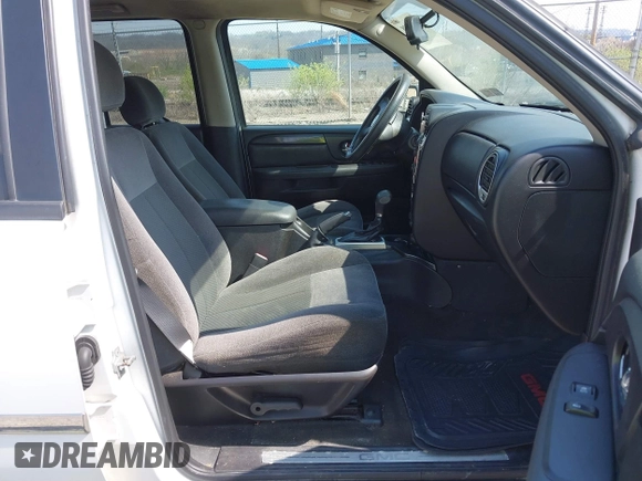 2008 GMC Envoy SLE2 with VIN 1GKDT13S682112642, listed as a IAAI auction lot 42062008 with 162,467 mi miles. Bid and sale history available at carsss.com. Image 5.