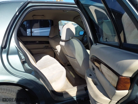 2006 Mercury Grand Marquis GS with VIN 2MEFM74V16X650056, listed as a IAAI auction lot 42107815 with 156,710 mi miles. Bid and sale history available at carsss.com. Image 8.
