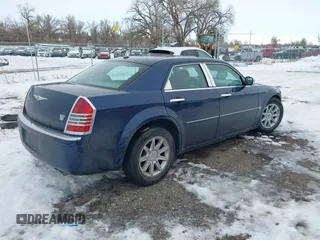 2006 Chrysler 300 C with VIN 2C3LA63H96H289693, listed as a IAAI auction lot 41308366 with 128,814 mi miles. Bid and sale history available at carsss.com. Image 4.