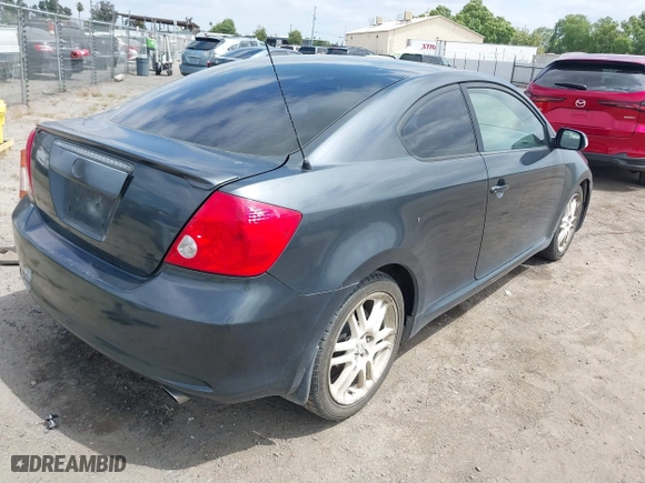 2006 Scion tC with VIN JTKDE177260081483, listed as a IAAI auction lot 42076072 with 156,556 mi miles. Bid and sale history available at carsss.com. Image 4.
