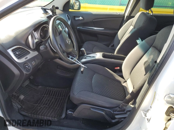 2012 Dodge Journey SXT z VIN 3C4PDCBG0CT364005, wystawiony jako Copart lot #55636265 z przebiegiem 150 048 mil mil oraz Szkoda całkowita • Salvage title. Historia ofert i sprzedaży dostępna na DreamBid. Obrazek 7.