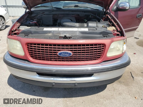 1998 Ford F-150 z VIN 1FTZF17W1WNA59477, wystawiony jako Copart lot #55849255 z przebiegiem 107 471 mil mil oraz Szkoda całkowita • Salvage title. Historia ofert i sprzedaży dostępna na DreamBid. Obrazek 11.