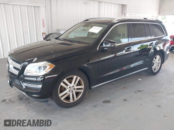 2014 Mercedes-Benz GL 450 z VIN 4JGDF7CE7EA435479, wystawiony jako IAAI lot #42280243 z przebiegiem 138 930 mil mil oraz . Historia ofert i sprzedaży dostępna na DreamBid. Obrazek 17.