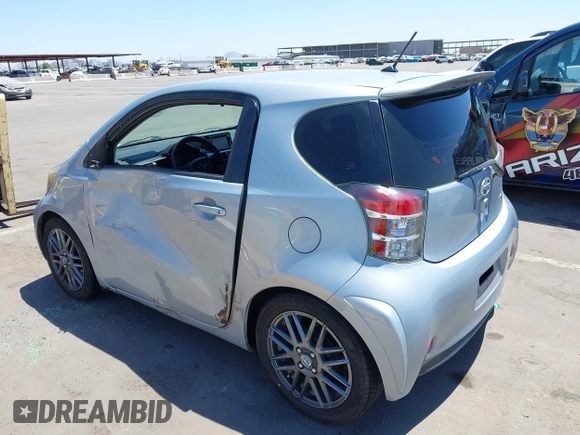 2014 Scion iQ with VIN JTNJJXB02EJ027026, listed as a IAAI auction lot 42619439 with 103,261 mi miles and . Bid and sale history available at DreamBid. Image 6.