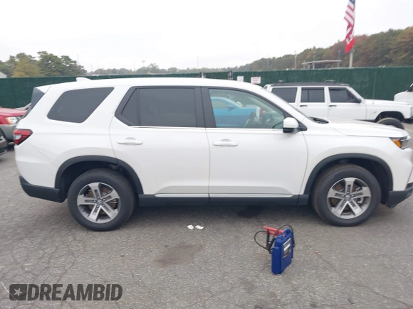 2023 Honda Pilot EX-L with VIN 5FNYG1H58PB016138, listed as a IAAI auction lot 40591717 with 10,068 mi miles and . Bid and sale history available at DreamBid. Image 13.