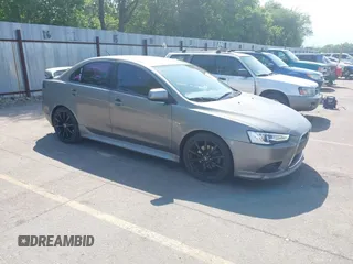 2014 Mitsubishi Lancer GT with VIN JA32U8FW8EU021409, listed as a IAAI auction lot 42758073 with 155,012 mi miles and . Bid and sale history available at DreamBid. Image 1.