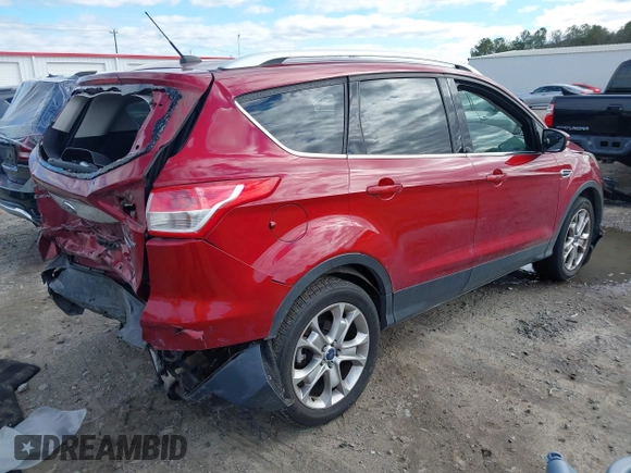 2014 Ford Escape Titanium with VIN 1FMCU9J95EUB05518, listed as a IAAI auction lot 41734025 with 188,243 mi miles. Bid and sale history available at carsss.com. Image 4.