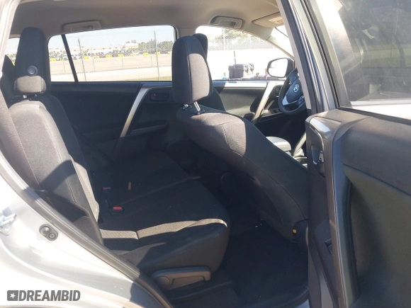 2018 Toyota RAV4 LE with VIN JTMZFREVXJJ196183, listed as a IAAI auction lot 41776107 with 82,713 mi miles. Bid and sale history available at carsss.com. Image 8.
