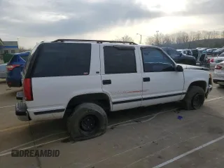 1998 Chevrolet Tahoe z VIN 1GNEK13R7WJ340188, wystawiony jako Copart lot #52177815 z przebiegiem 217 850 mil mil oraz Szkody całkowita. Historia ofert i sprzedaży dostępna na DreamBid. Obrazek 3.