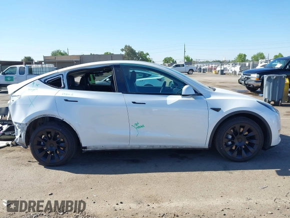 2022 Tesla Model Y Long Range with VIN 7SAYGDEE1NF364241, listed as a IAAI auction lot 42190272 with 54,878 mi miles and . Bid and sale history available at DreamBid. Image 13.