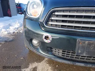 2013 MINI Cooper Countryman with VIN WMWZB3C57DWR35705, listed as a IAAI auction lot 41620080 with 197,884 mi miles. Bid and sale history available at carsss.com. Image 6.