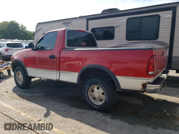 1998 Ford F-150 with VIN 1FTZF1821WKA63445, listed as a Copart auction lot 62563374 with 270,311 mi miles and Salvage title. Bid and sale history available at DreamBid. Image 2.