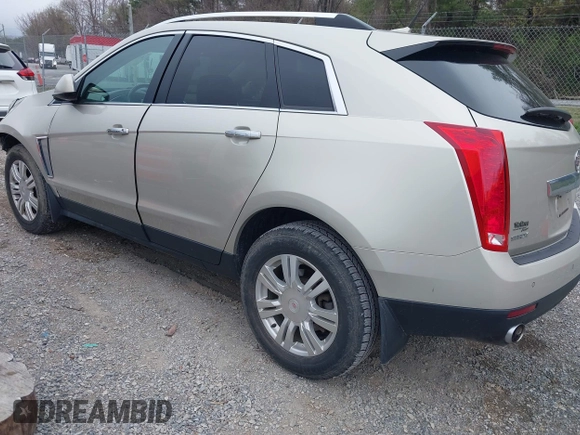 2013 Cadillac SRX Luxury Collection with VIN 3GYFNCE3XDS654531, listed as a IAAI auction lot 41931295 with 120,255 mi miles and . Bid and sale history available at carsss.com. Image 3.