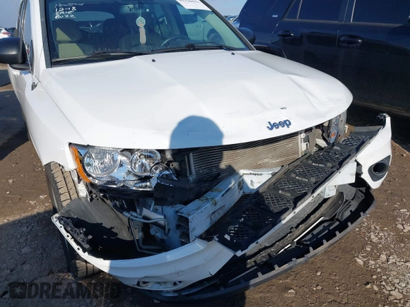 2011 Jeep Compass with VIN 1J4NT1FA2BD239588, listed as a IAAI auction lot 41324431 with 190,116 mi miles. Bid and sale history available at carsss.com. Image 6.