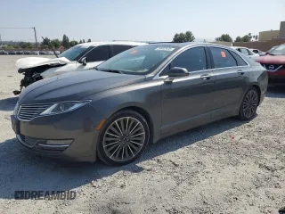 2015 Lincoln MKZ z VIN 3LN6L2J90FR627540, wystawiony jako Copart lot #59802935 z przebiegiem 52 510 mil mil oraz Czysty tytuł • Clean title. Historia ofert i sprzedaży dostępna na DreamBid. Obrazek 1.