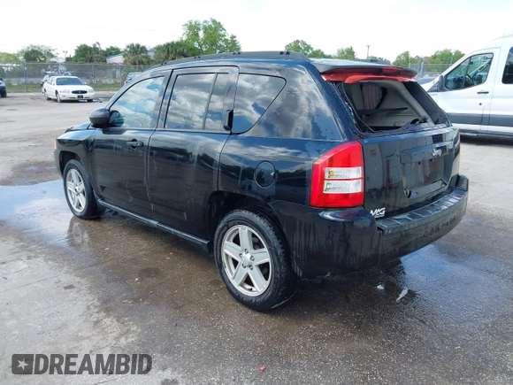 2007 Jeep Compass Sport with VIN 1J8FT47W57D119595, listed as a IAAI auction lot 41782027 with 223,203 mi miles. Bid and sale history available at carsss.com. Image 3.