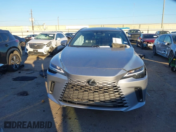 2023 Lexus RX with VIN JTJCHMAA1P2000203, listed as a IAAI auction lot 41409470 with 1 mi miles. Bid and sale history available at carsss.com. Image 11.