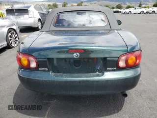 1999 Mazda MX-5 Miata z VIN JM1NB3539X0107918, wystawiony jako Copart lot #56693795 z przebiegiem 42 518 mil mil oraz Czysty tytuł • Clean title. Historia ofert i sprzedaży dostępna na DreamBid. Obrazek 6.