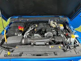 2022 Jeep Wrangler Unlimited Sahara Altitude with VIN 1C4HJXEG6NW248854, listed as a Copart auction lot 80591644 with 33,569 mi miles and Clean title. Bid and sale history available at DreamBid. Image 7.