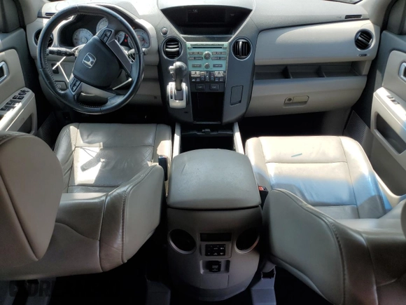 2011 Honda Pilot EX-L z VIN 5FNYF3H51BB032527, wystawiony jako Copart lot #57422335 z przebiegiem 170 089 mil mil oraz Szkoda całkowita • Salvage title. Historia ofert i sprzedaży dostępna na DreamBid. Obrazek 8.
