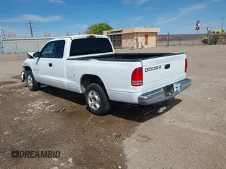 1999 Dodge Dakota SLT with VIN 1B7GL22X6XS186007, listed as a IAAI auction lot 41953254 with 322,541 mi miles. Bid and sale history available at carsss.com. Image 3.