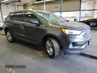 2019 Ford Edge SEL with VIN 2FMPK4J95KBB76844, listed as a Copart auction lot 59323925 with 122,326 mi miles and Salvage title. Bid and sale history available at DreamBid. Image 4.