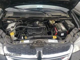 2015 Dodge Grand Caravan SXT with VIN 2C4RDGCG2FR648841, listed as a Copart auction lot 51134455 with 121,570 mi miles and Salvage Title. Bid and sale history available at DreamBid. Image 12.