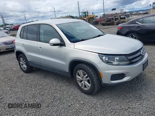 2013 Volkswagen Tiguan SEL with VIN WVGBV3AX1DW571843, listed as a IAAI auction lot 42540191 with 140,639 mi miles and . Bid and sale history available at DreamBid. Image 1.