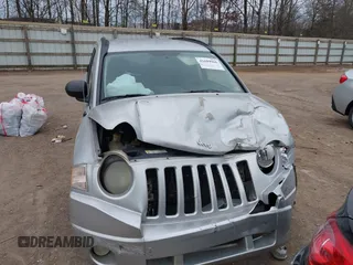 2007 Jeep Compass Sport with VIN 1J8FT47W57D397445, listed as a IAAI auction lot 41699966 with 235,960 mi miles. Bid and sale history available at carsss.com. Image 6.
