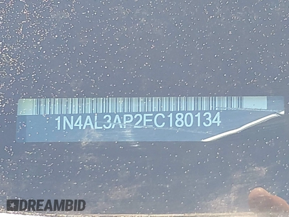 2014 Nissan Altima SV with VIN 1N4AL3AP2EC180134, listed as a IAAI auction lot 41832553 with 248,506 mi miles and . Bid and sale history available at DreamBid. Image 9.
