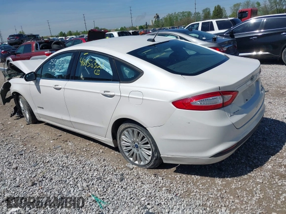 2013 Ford Fusion SE Hybrid z VIN 3FA6P0LU9DR349321, wystawiony jako IAAI lot #42156321 z przebiegiem 90 688 mil mil oraz . Historia ofert i sprzedaży dostępna na DreamBid. Obrazek 3.