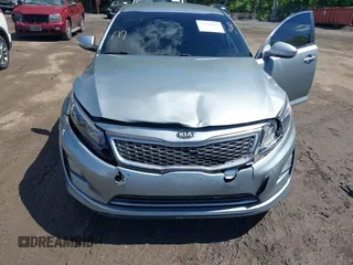 2015 Kia Optima Hybrid with VIN KNAGM4AD2F5082642, listed as a IAAI auction lot 39434717 with 131,000 mi miles. Bid and sale history available at carsss.com. Image 6.