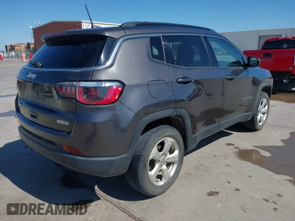 2018 Jeep Compass Altitude with VIN 3C4NJDBBXJT185252, listed as a IAAI auction lot 41847785 with 126,915 mi miles and . Bid and sale history available at carsss.com. Image 4.