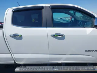 2015 GMC Canyon 2WD SLT with VIN 1GTG5CE36F1151433, listed as a IAAI auction lot 41636107 with 117,682 mi miles. Bid and sale history available at carsss.com. Image 13.