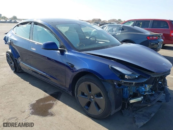 2023 Tesla Model 3 with VIN 5YJ3E1EA9PF697573, listed as a IAAI auction lot 41173833 with 6,966 mi miles. Bid and sale history available at carsss.com. Image 1.