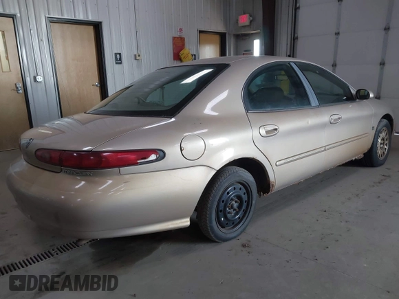 1999 Mercury Sable LS Premium Group with VIN 1MEFM53S2XG611480, listed as a IAAI auction lot 42194022 with 144,955 mi miles and . Bid and sale history available at DreamBid. Image 4.