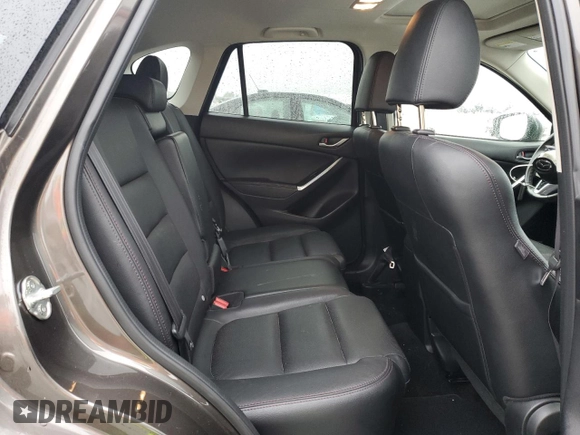 2016 Mazda CX-5 Grand Touring with VIN JM3KE2DY4G0811386, listed as a Copart auction lot 51961795 with 99,525 mi miles and Salvage Title. Bid and sale history available at carsss.com. Image 11.