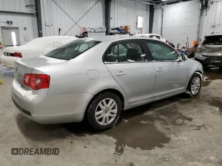 2006 Volkswagen Jetta z VIN 3VWRF31K86M618158, wystawiony jako Copart lot #42728175 z przebiegiem 117 433 mil mil oraz Czysty tytuł • Clean title. Historia ofert i sprzedaży dostępna na DreamBid. Obrazek 3.