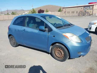 2007 Toyota Yaris with VIN JTDJT923475072209, listed as a IAAI auction lot 42139042 with 335,137 mi miles. Bid and sale history available at carsss.com. Image 1.
