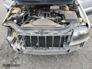 2004 Jeep Grand Cherokee Laredo with VIN 1J4GX48S64C151124, listed as a Copart auction lot 52669445 with 152,970 mi miles and Salvage Title. Bid and sale history available at carsss.com. Image 12.